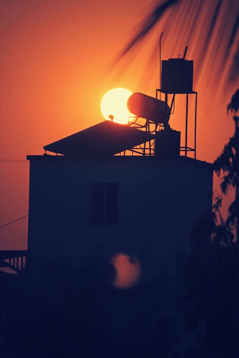 solar hot water heating system, against sunset byron bay